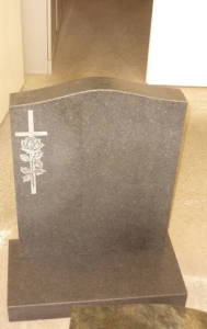 honed granite headstone with inlayed carving honed granite headstone with carving